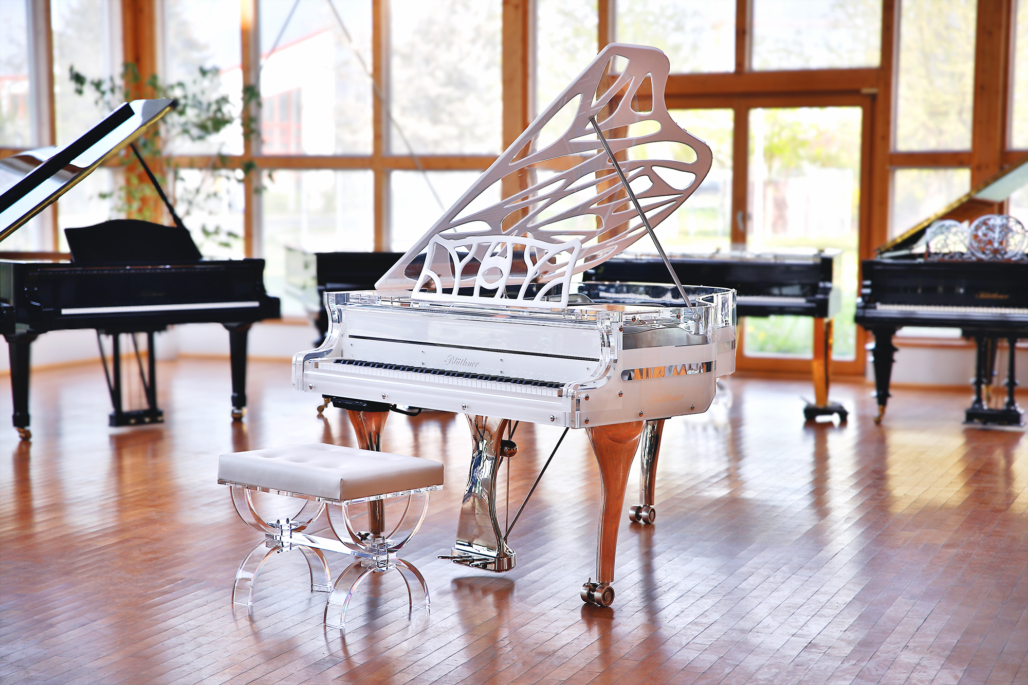 White Blüthner Crystal Hive Elegance Grand Piano with a titanium coloured iron frame